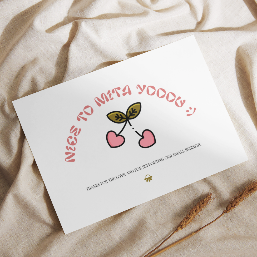 Photo of a bag between flowers.